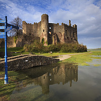 Buy canvas prints of High Tide at Laugharne Castle by Andrew Ray