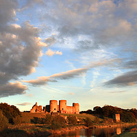 Buy canvas prints of Clouds Over Rhuddlan Castle by Andrew Ray