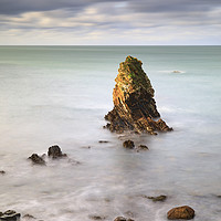 Buy canvas prints of Porth Saint sea stack. by Andrew Ray