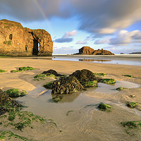 Buy canvas prints of Rainbow over Perranporth Arch by Andrew Ray