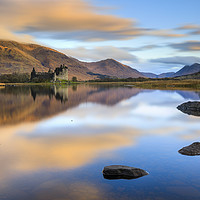 Buy canvas prints of Colud reflections at sunrise (Kilchurn Castle) by Andrew Ray