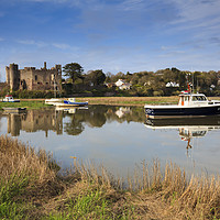 Buy canvas prints of Laugharne Castle at high tide by Andrew Ray