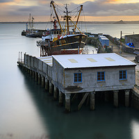 Buy canvas prints of Newlyn dry dock at sunrise by Andrew Ray