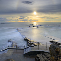 Buy canvas prints of Sunbow over the swimming pool steps (Bude) by Andrew Ray