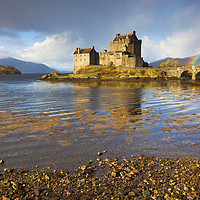 Buy canvas prints of Rainbow at Eilean Donan Castle by Andrew Ray