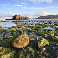 Buy canvas prints of Boulders on Perranporth Beach  by Andrew Ray
