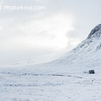 Buy canvas prints of Lagangarbh Cottage beneath Buachaille Etive Mor in winter snow by Howard Kennedy