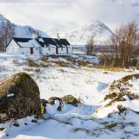 Buy canvas prints of Black Rock Cottage in Glencoe in winter snow by Howard Kennedy