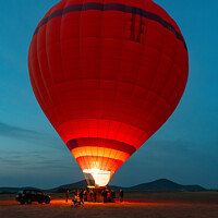 Buy canvas prints of Hot-Air Balloon preparing for take-off by Howard Kennedy