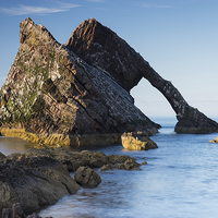 Buy canvas prints of  Evening light on Bow Fiddle Rock by Howard Kennedy