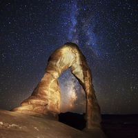 Buy canvas prints of Milky Way at Delicate Arch by Amit Saha