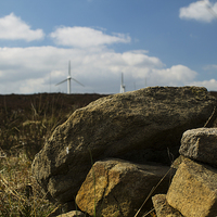 Buy canvas prints of  Rocks and Wind turbines  by Richard Auty
