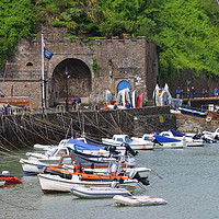 Buy canvas prints of Moored up to the Harbour Wall, Tenby by Jane Emery