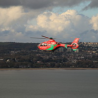 Buy canvas prints of Wales Air Ambulance over Swansea Bay by Jane Emery