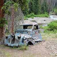 Buy canvas prints of Old Forgotten Studebaker by JUDY LACEFIELD