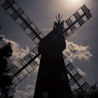 Buy canvas prints of  Silhouette of a Windmill by Louise Wilden