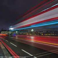 Buy canvas prints of London Bus lights at night by Louise Wilden