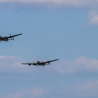 Buy canvas prints of  Two Lancaster Bombers, Spitfire and Hurricane by Graham Pickavance