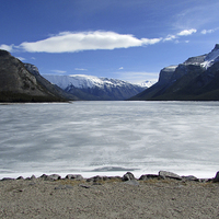 Buy canvas prints of  Frozen Lake Minnewanka, Canada. by alastair morgan
