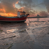 Buy canvas prints of Lindisfarne fishing boat sunrise by Antony Burch