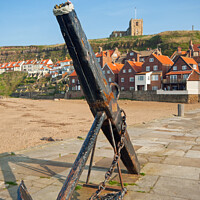 Buy canvas prints of Whitby anchor and church by Antony Burch
