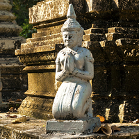 Buy canvas prints of Buddhist Cemetery in the grounds of Angkor Wat by Dave Carroll