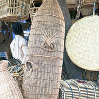 Buy canvas prints of Cambodian Fish Traps at a market by Dave Carroll