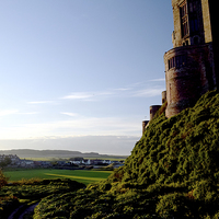 Buy canvas prints of  Stunning view from behind Bamburgh Castle by Michael Maher