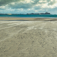 Buy canvas prints of Blowing sand on St Helier beach by Jonathon barnett