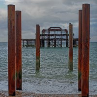 Buy canvas prints of Old Pier in Brighton by John Wilcox