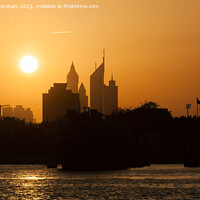 Buy canvas prints of Sun sets over Dubai Creek  by Richard Wareham