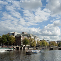 Buy canvas prints of River Amstel with Royal Theatre Carre  by Richard Wareham