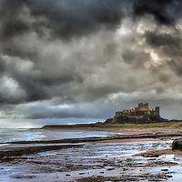 Buy canvas prints of Dramatic Bamburgh Castle by David Hall