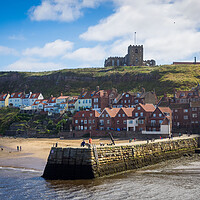 Buy canvas prints of Whitby Abbey overlooking the harbour wall by David Hall