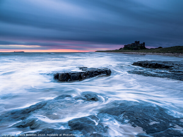 Majestic Bamburgh Castle at Dawn Picture Board by Rick Bowden