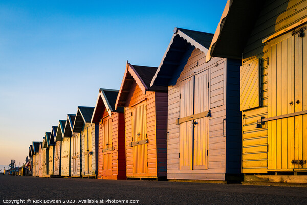 Sun-Kissed Cromer Beach Huts Picture Board by Rick Bowden