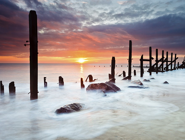 Majestic Sunrise at Happisburgh Picture Board by Rick Bowden