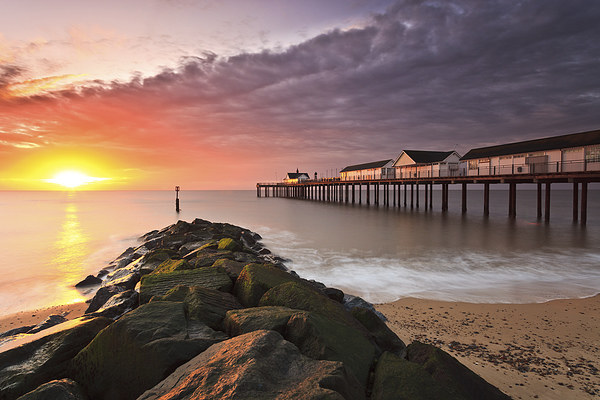 Serene Sunrise at Southwold Pier Picture Board by Rick Bowden
