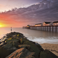 Buy canvas prints of Serene Sunrise at Southwold Pier by Rick Bowden