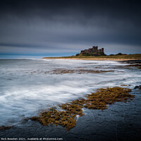 Buy canvas prints of Majestic sunrise over historic Bamburgh Castle by Rick Bowden