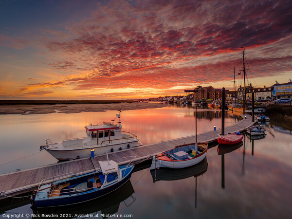 Sunrise over Wells next the Sea Harbour Picture Board by Rick Bowden