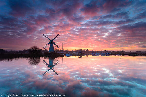 Fiery Sunrise over Thurne Mill Picture Board by Rick Bowden