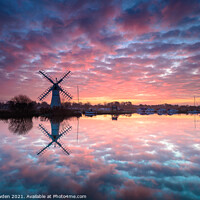 Buy canvas prints of Fiery Sunrise over Thurne Mill by Rick Bowden