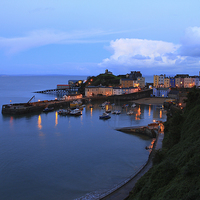 Buy canvas prints of Sunset Tenby Harbour with lights by Jonathan Evans