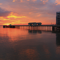 Buy canvas prints of Penarth Pier in wales at sunrise by Jonathan Evans