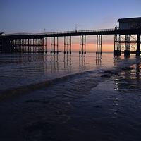 Buy canvas prints of Penarth Pier at sunset  by Jonathan Evans