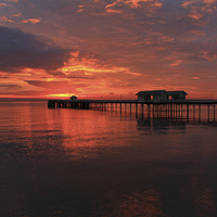 Buy canvas prints of Penarth Pier and sun rise over the bristol Channel by Jonathan Evans