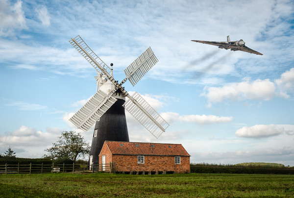 The Vulcan flying over leveton windmill Picture Board by Jason Thompson