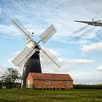 Buy canvas prints of The Vulcan flying over leveton windmill by Jason Thompson