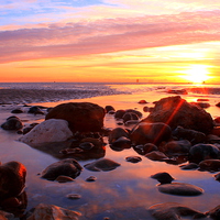 Buy canvas prints of  The Low tide sunset by Ross Lawford